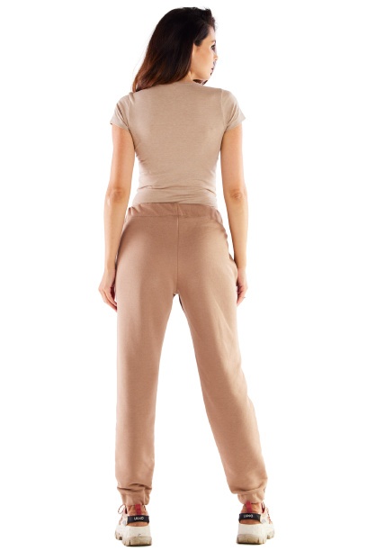 Spodnie damskie dresowe luźne bawełniane z kieszeniami beżowe
